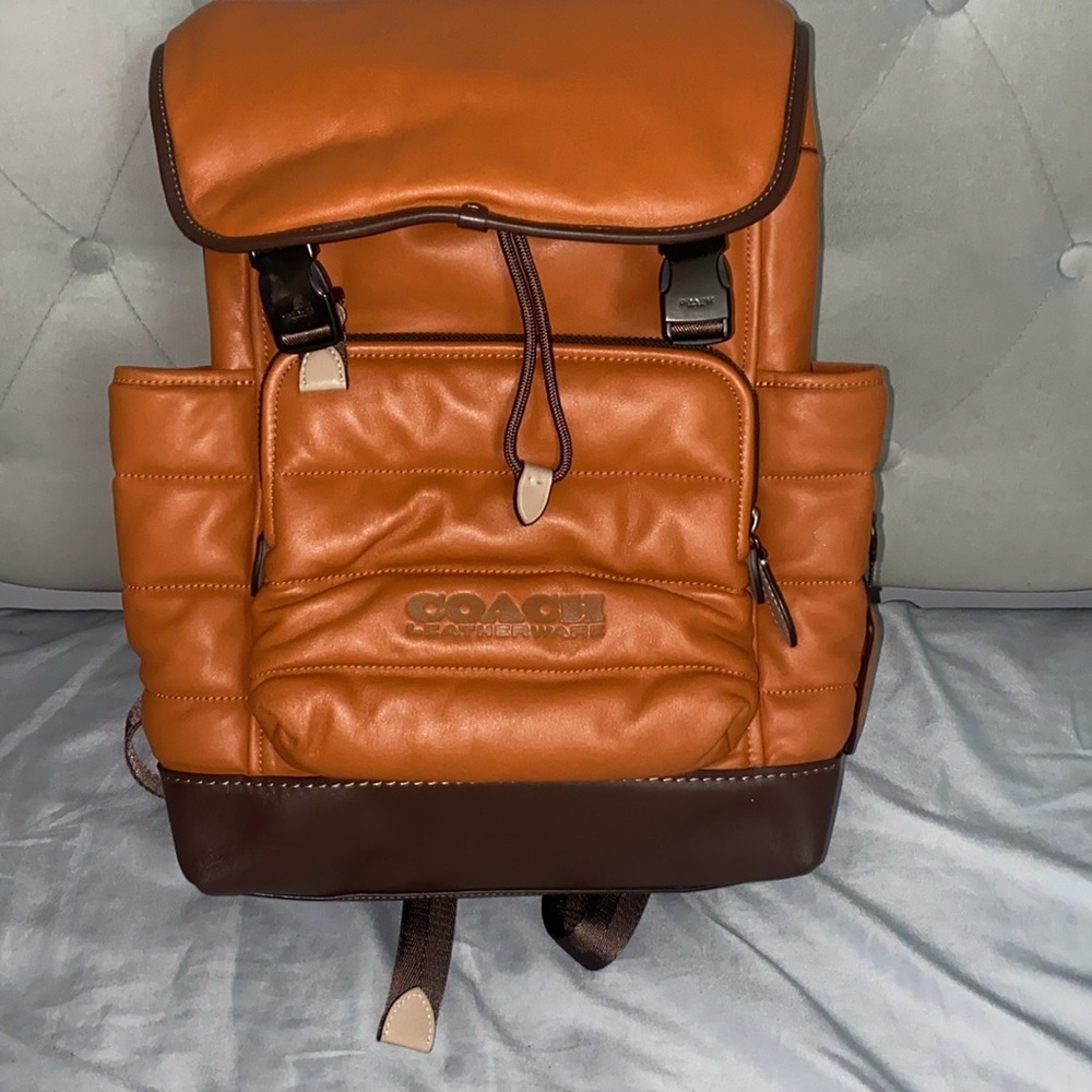 COACH orange league flap backpack